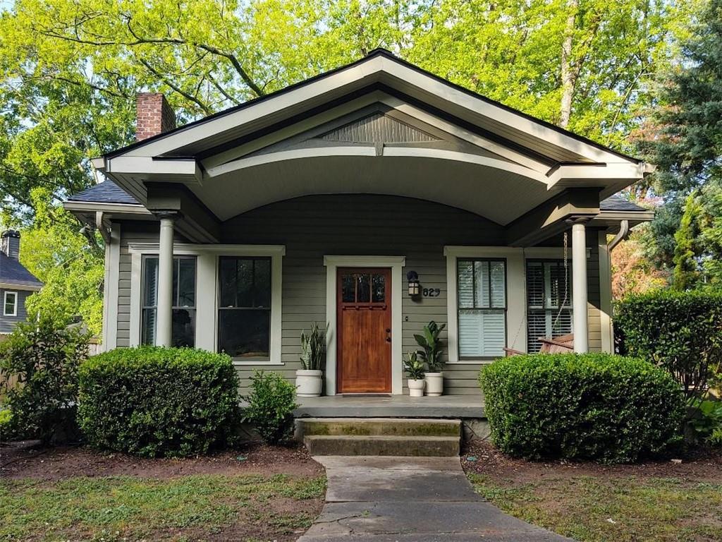 829 East Lake Drive Decatur, GA 30030 - Photo 1 of 1 a front view of a house with a garden