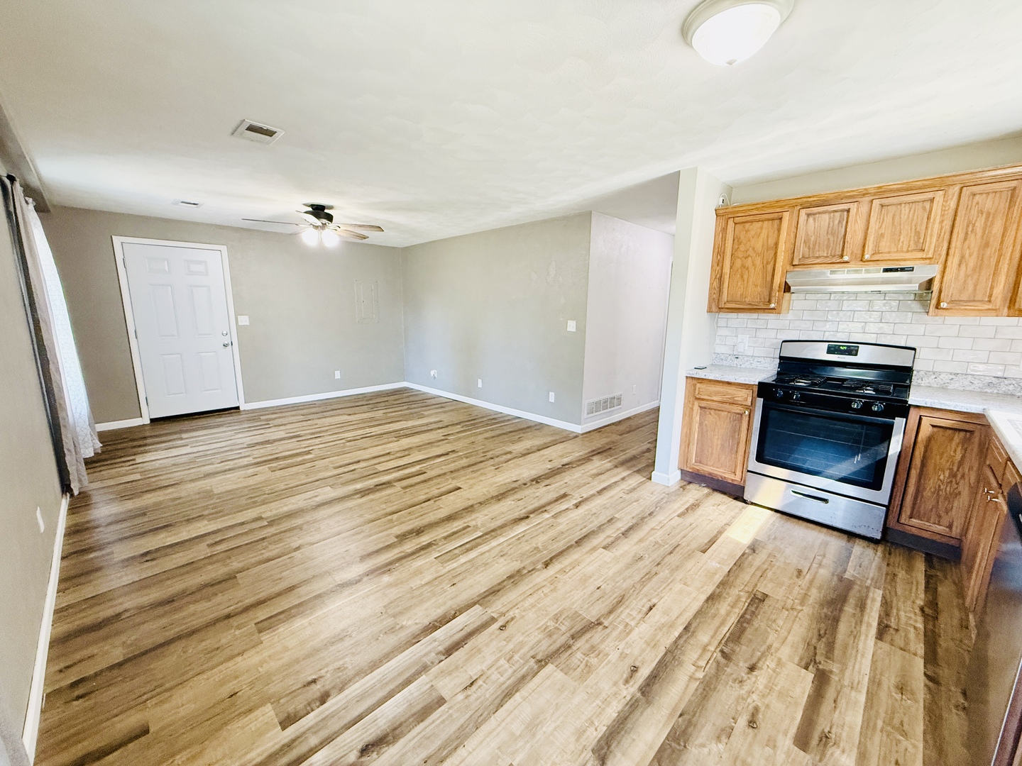 715 8th Street Colona, IL 61241 - Photo 4 of 14 a view of kitchen and microwave
