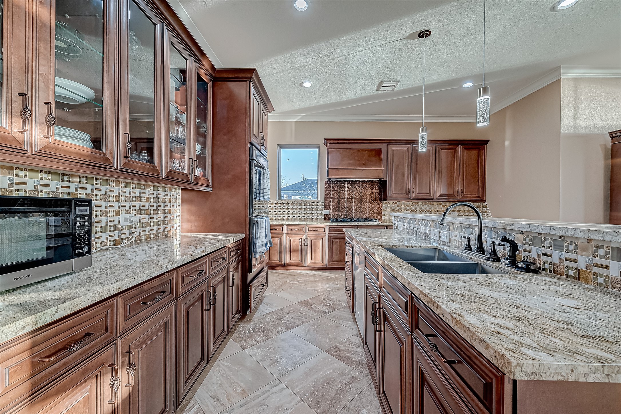 2011 Crescent Drive La Porte, TX 77571 - Photo 15 of 47 a kitchen with stainless steel appliances granite countertop a sink and a stove
