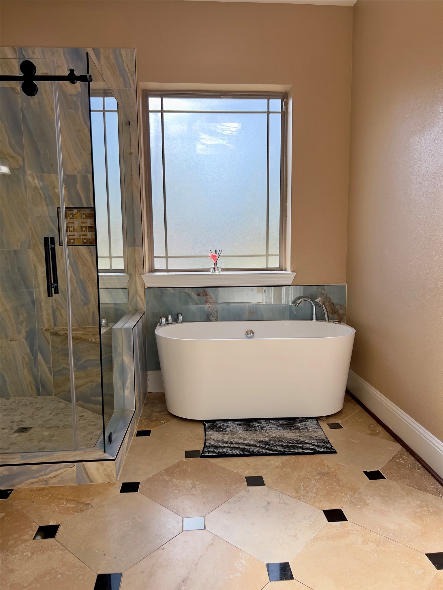 2011 Crescent Drive La Porte, TX 77571 - Photo 19 of 47 a white tub sitting next to a shower