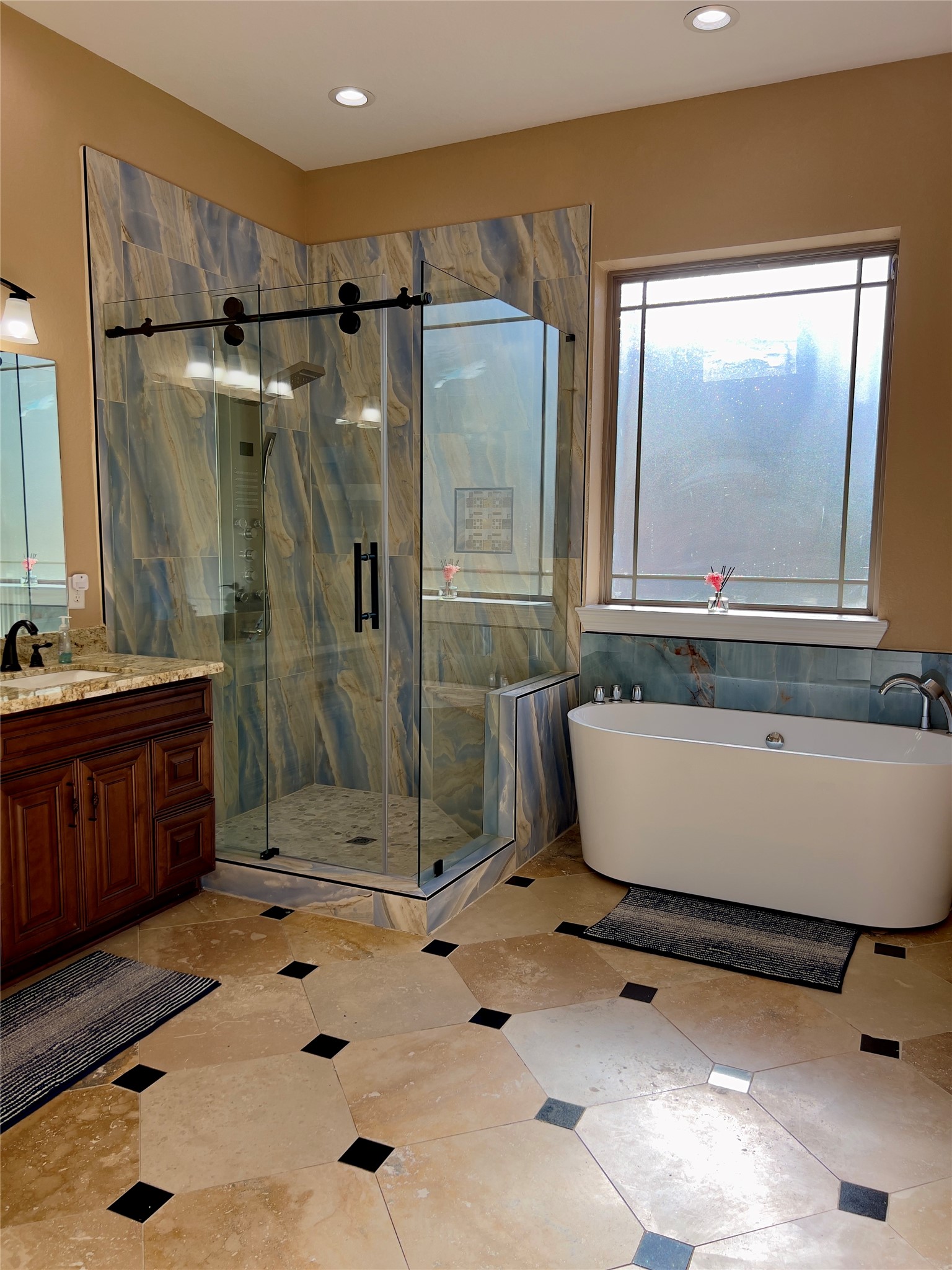 2011 Crescent Drive La Porte, TX 77571 - Photo 20 of 47 a bathroom with a bathtub and a shower