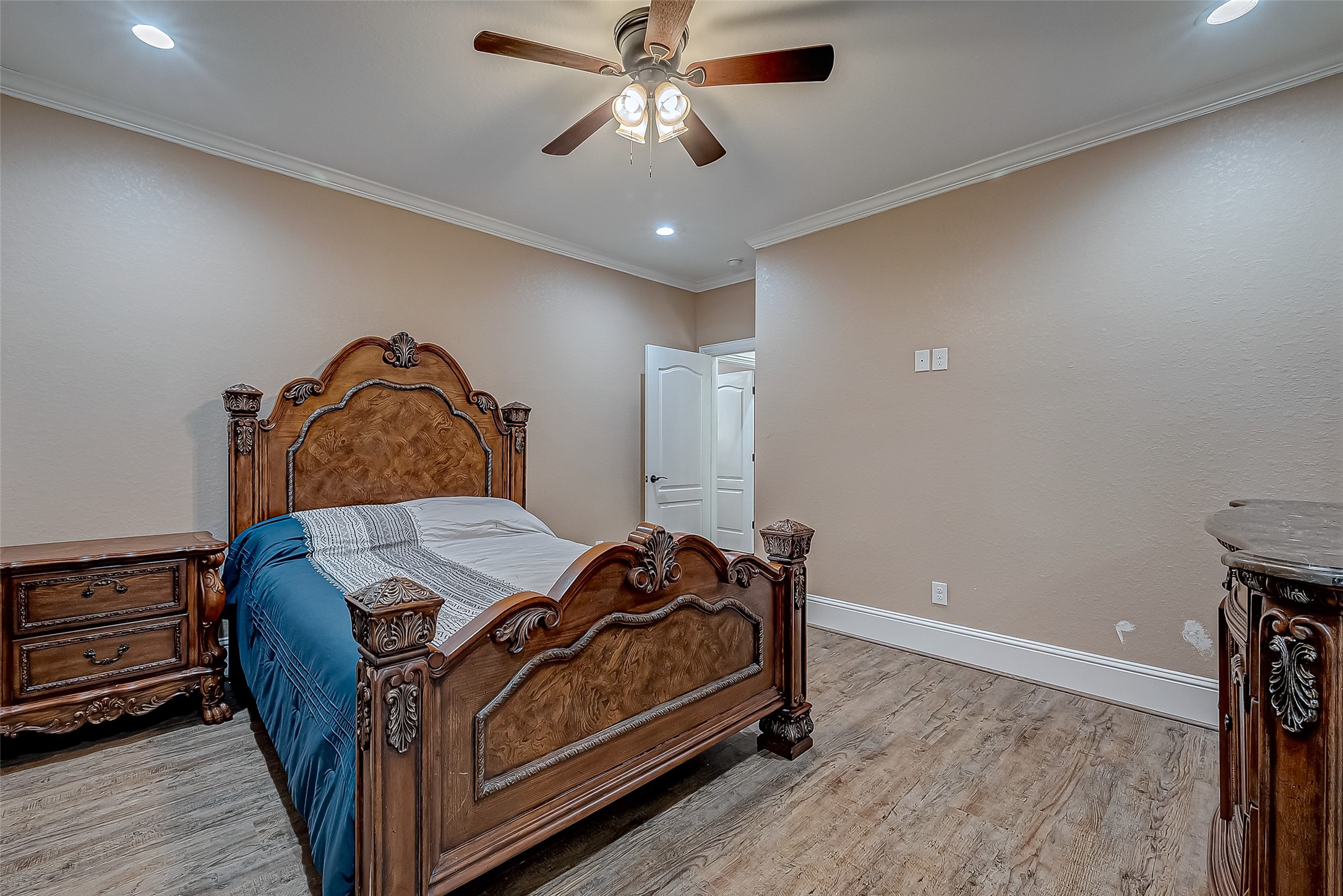 2011 Crescent Drive La Porte, TX 77571 - Photo 36 of 47 a bedroom with a bed and wooden floor