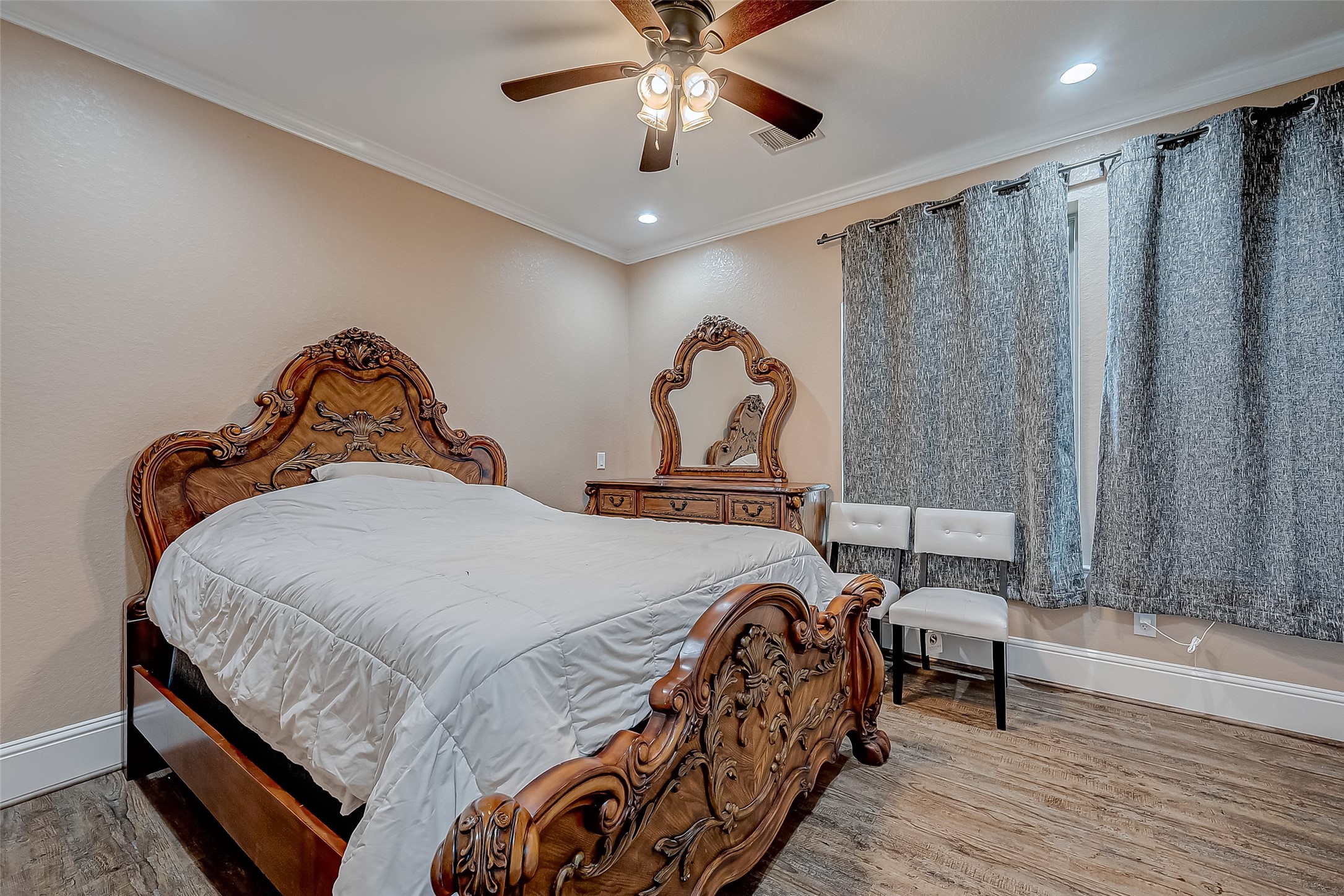 2011 Crescent Drive La Porte, TX 77571 - Photo 40 of 47 a bed room with a bed and a chandelier