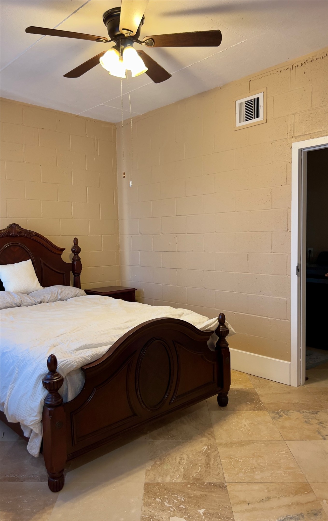2011 Crescent Drive La Porte, TX 77571 - Photo 42 of 47 a bedroom with a bed and a ceiling fan