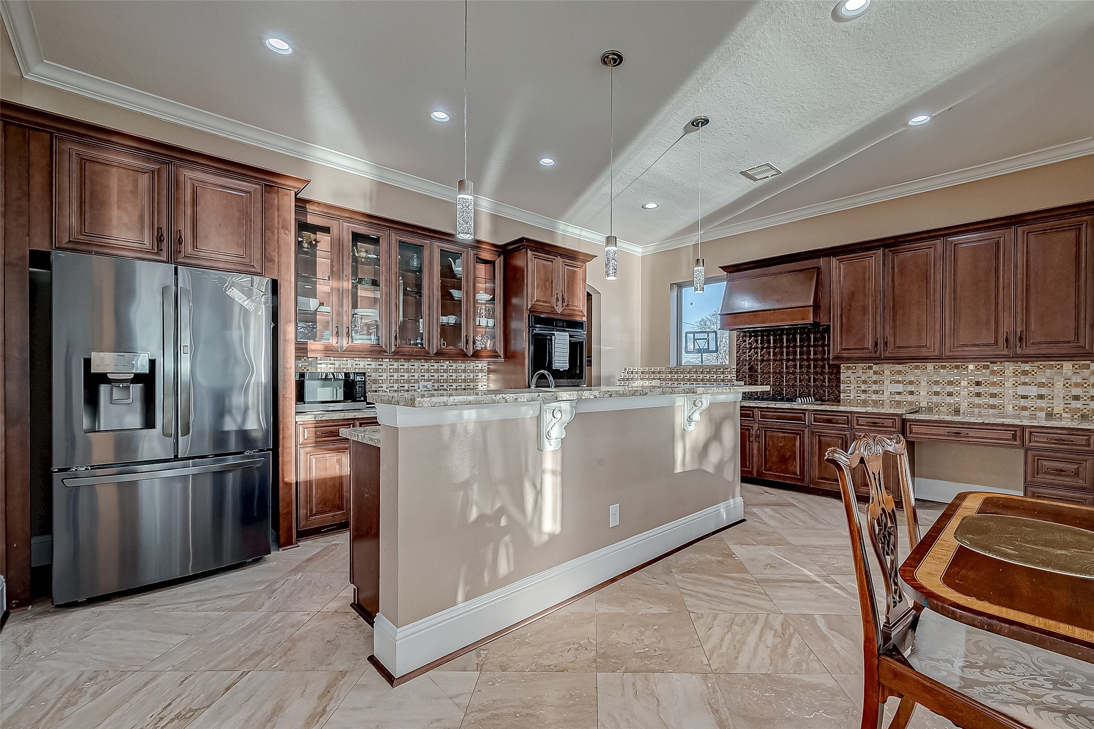 2011 Crescent Drive La Porte, TX 77571 - Photo 10 of 47 a kitchen with stainless steel appliances granite countertop a refrigerator a stove top oven a sink and dishwasher