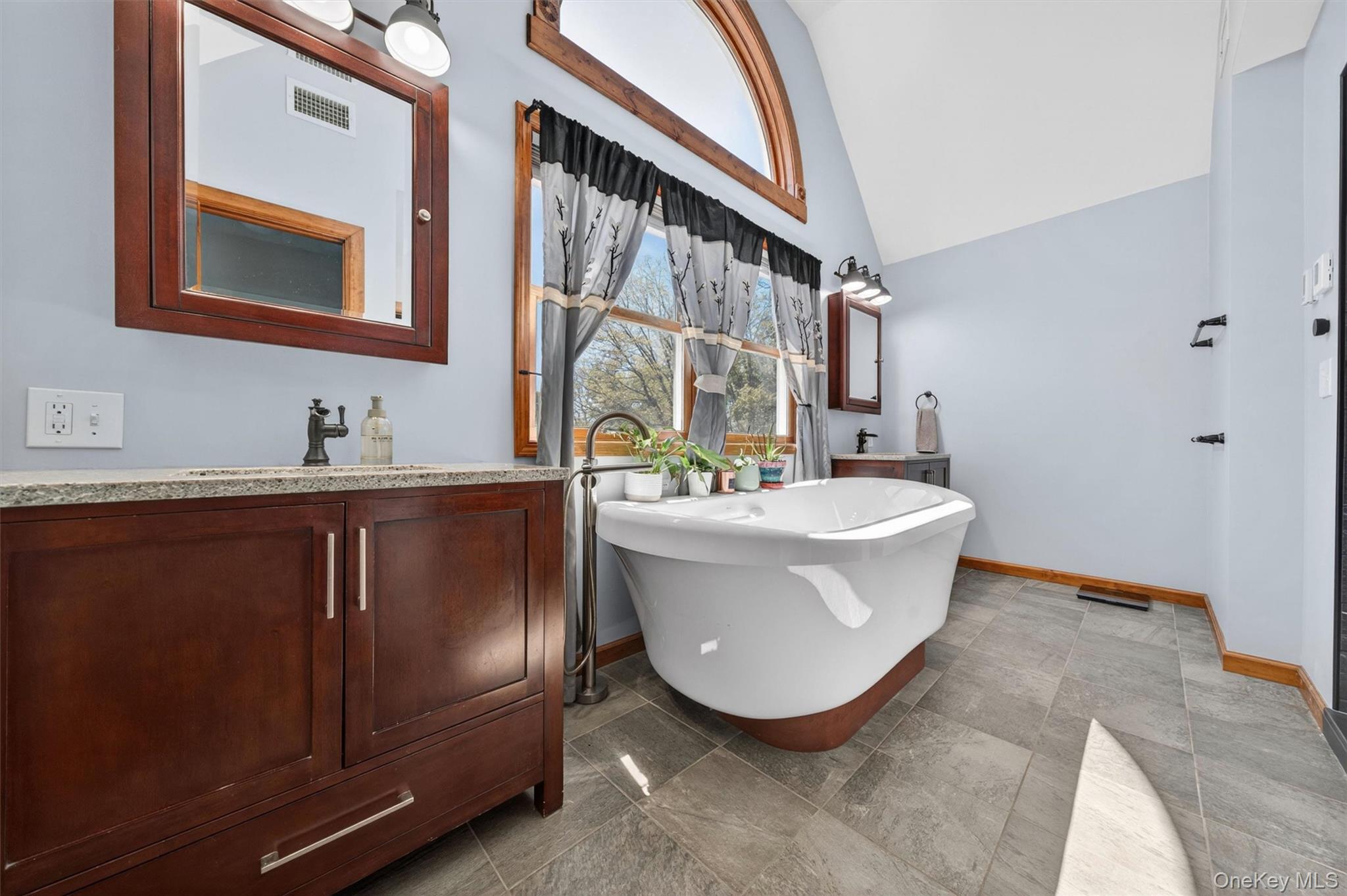 2 White Horse Road Middletown, NY 10940 - Photo 25 of 47 Renovated in 2025, the spa-style bathroom offers dual vanities and a luxurious soaking air tub.