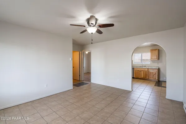 a view of a hallway with a chandelier