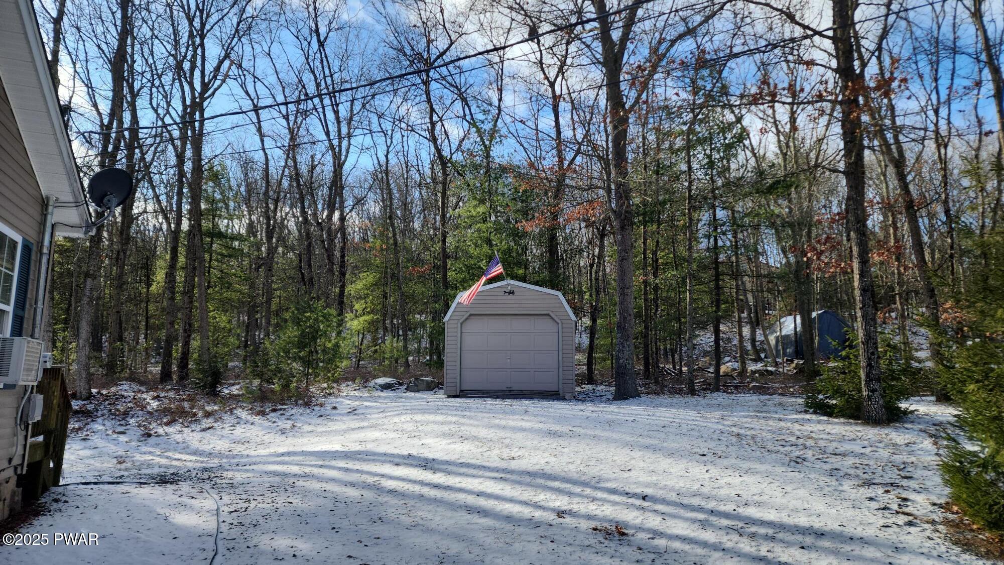 209 Neil Thompson Road Lackawaxen, PA 18425 - Photo 5 of 23 shed with garage door