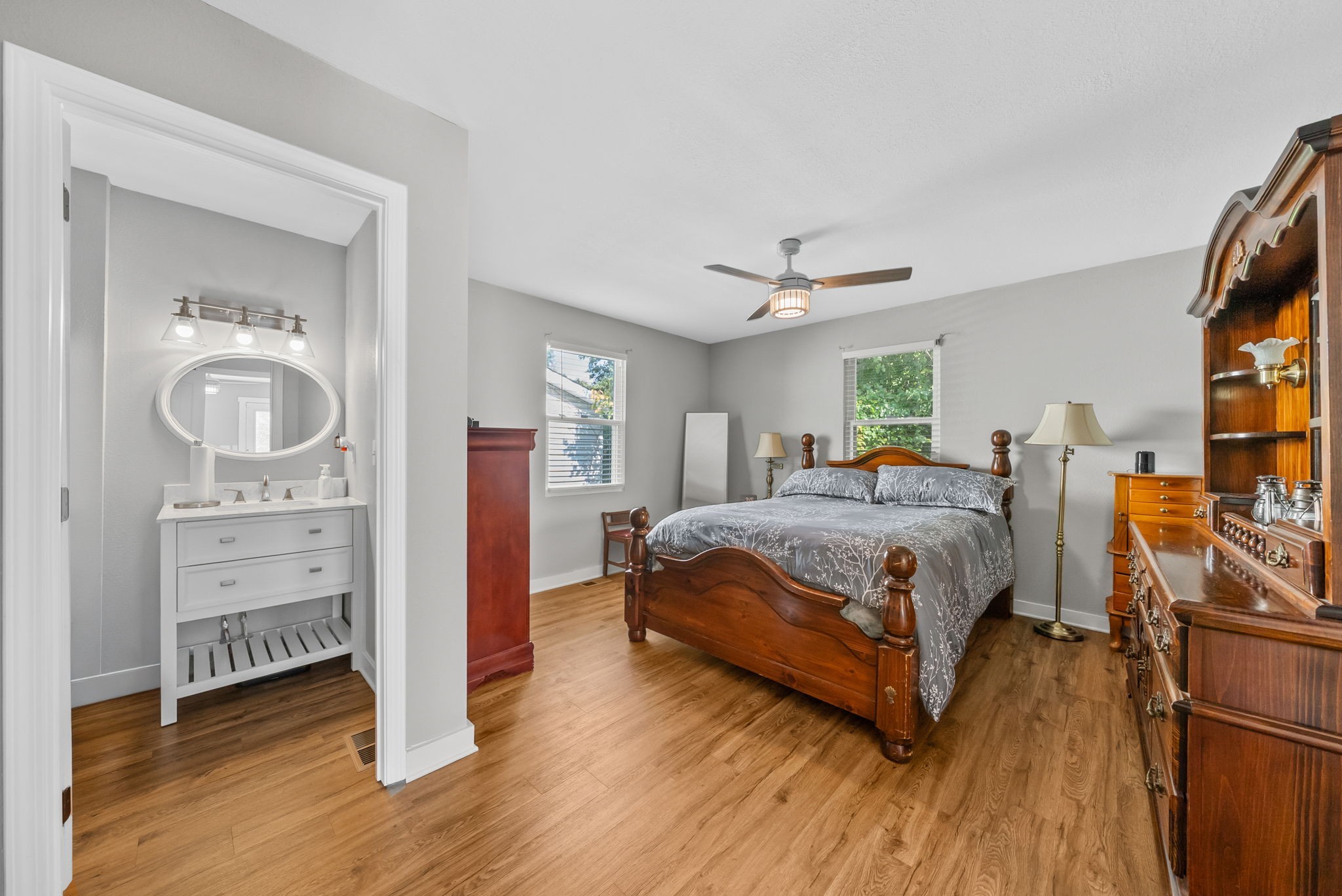 939 Shearor Street Clarksville, TN 37040 - Photo 12 of 26 a bedroom with a bed and wooden floor