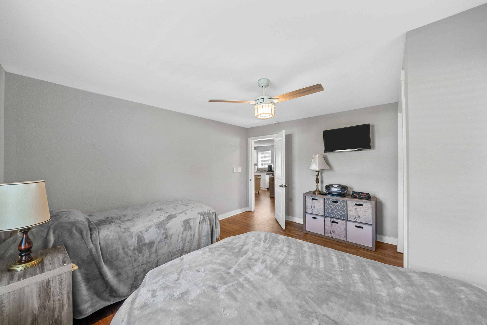 939 Shearor Street Clarksville, TN 37040 - Photo 22 of 26 a bedroom with furniture and a flat screen tv