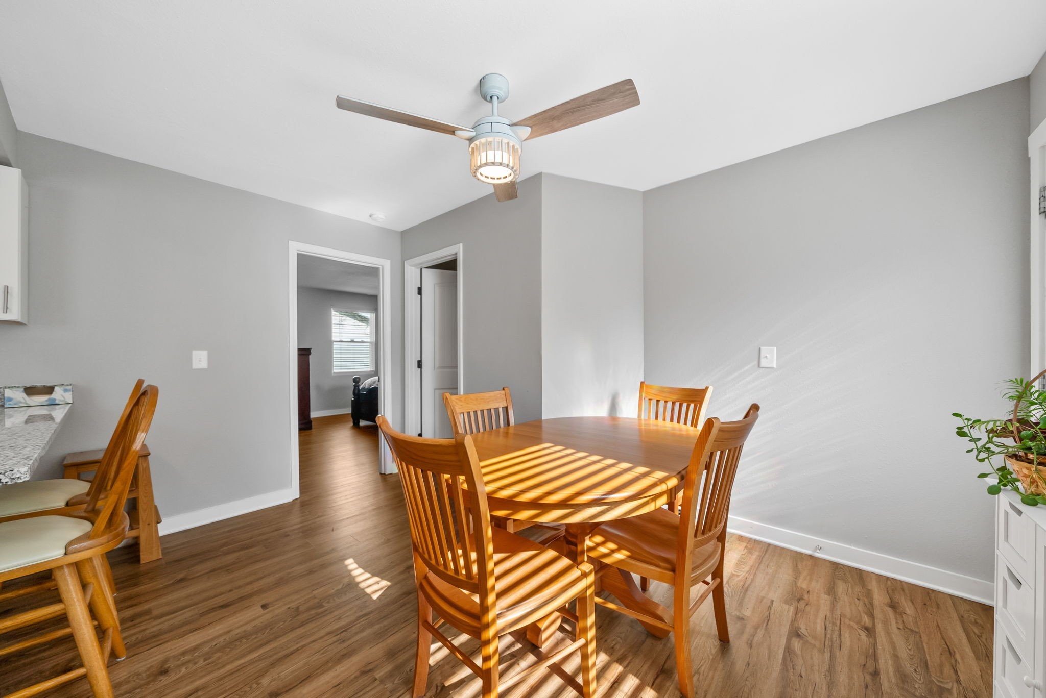 939 Shearor Street Clarksville, TN 37040 - Photo 10 of 26 a view of a dining room with furniture and wooden floor