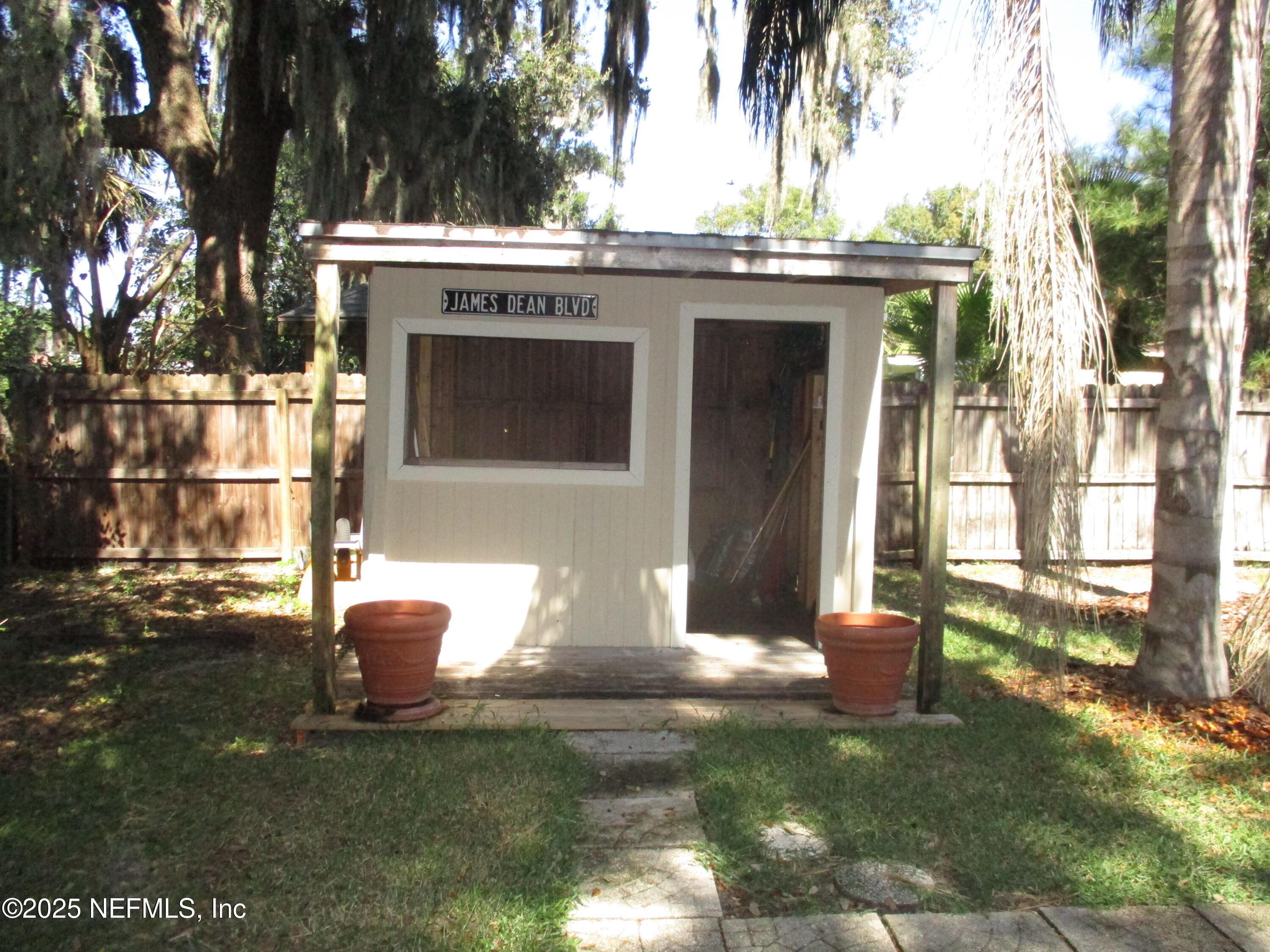 6114 Stetson Road Jacksonville, FL 32217 - Photo 23 of 23 a view of a house with a yard