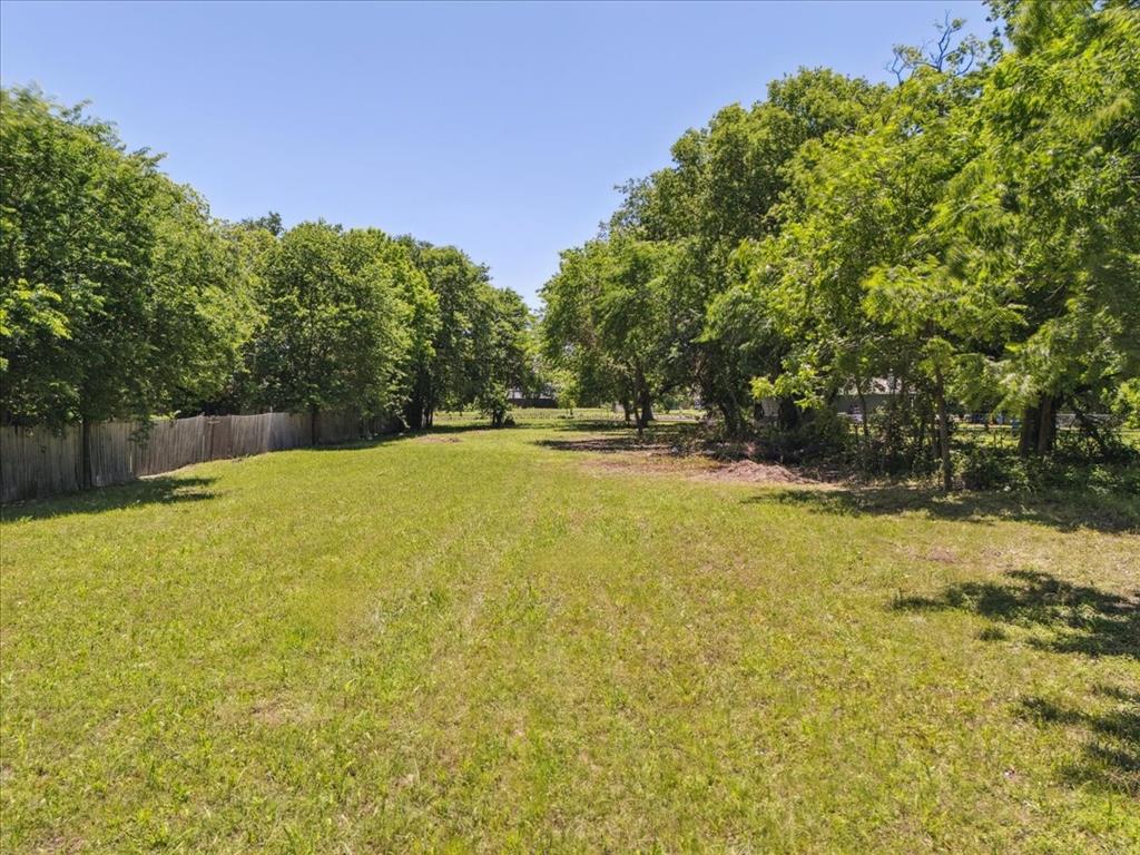 325 East Belt Line Road Wilmer, TX 75172 - Photo 2 of 9 View of yard with fence