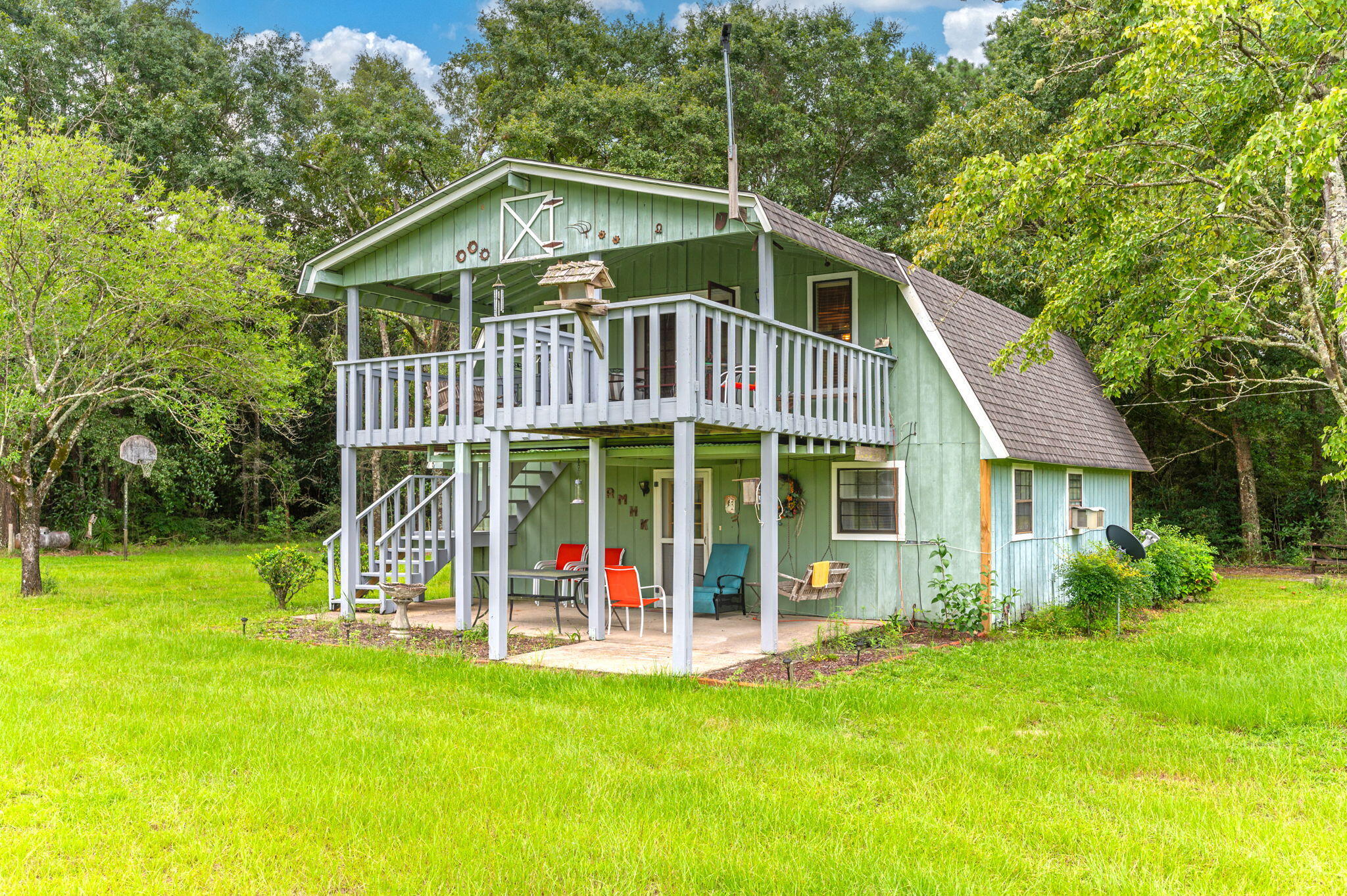 410 Kilpatrick Road Florala, AL 36442 - Photo 59 of 60 a view of a house with a yard and sitting area