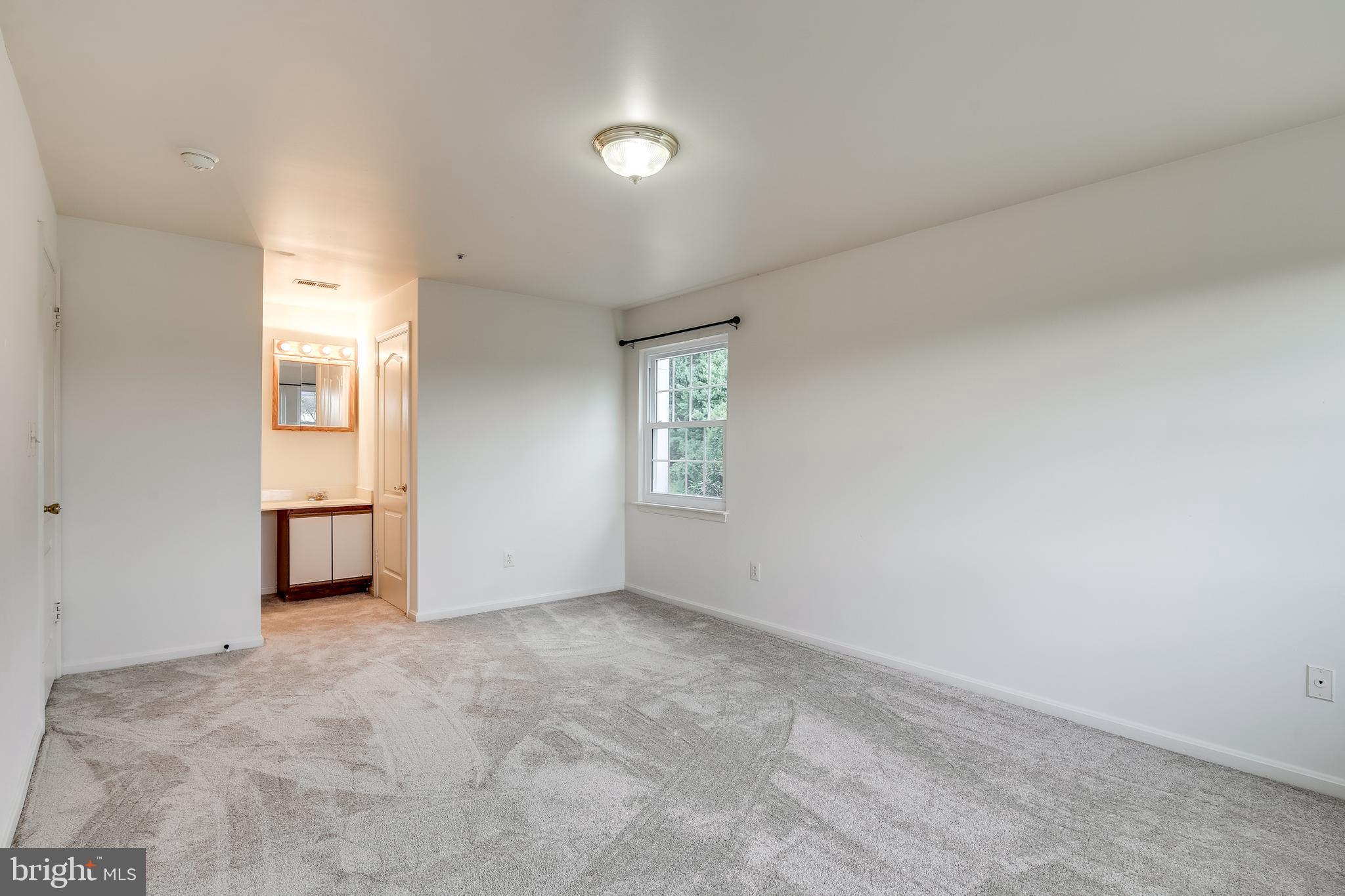 8341 Montgomery Run Road, Unit F Ellicott City, MD 21043 - Photo 18 of 29 Master Bedroom