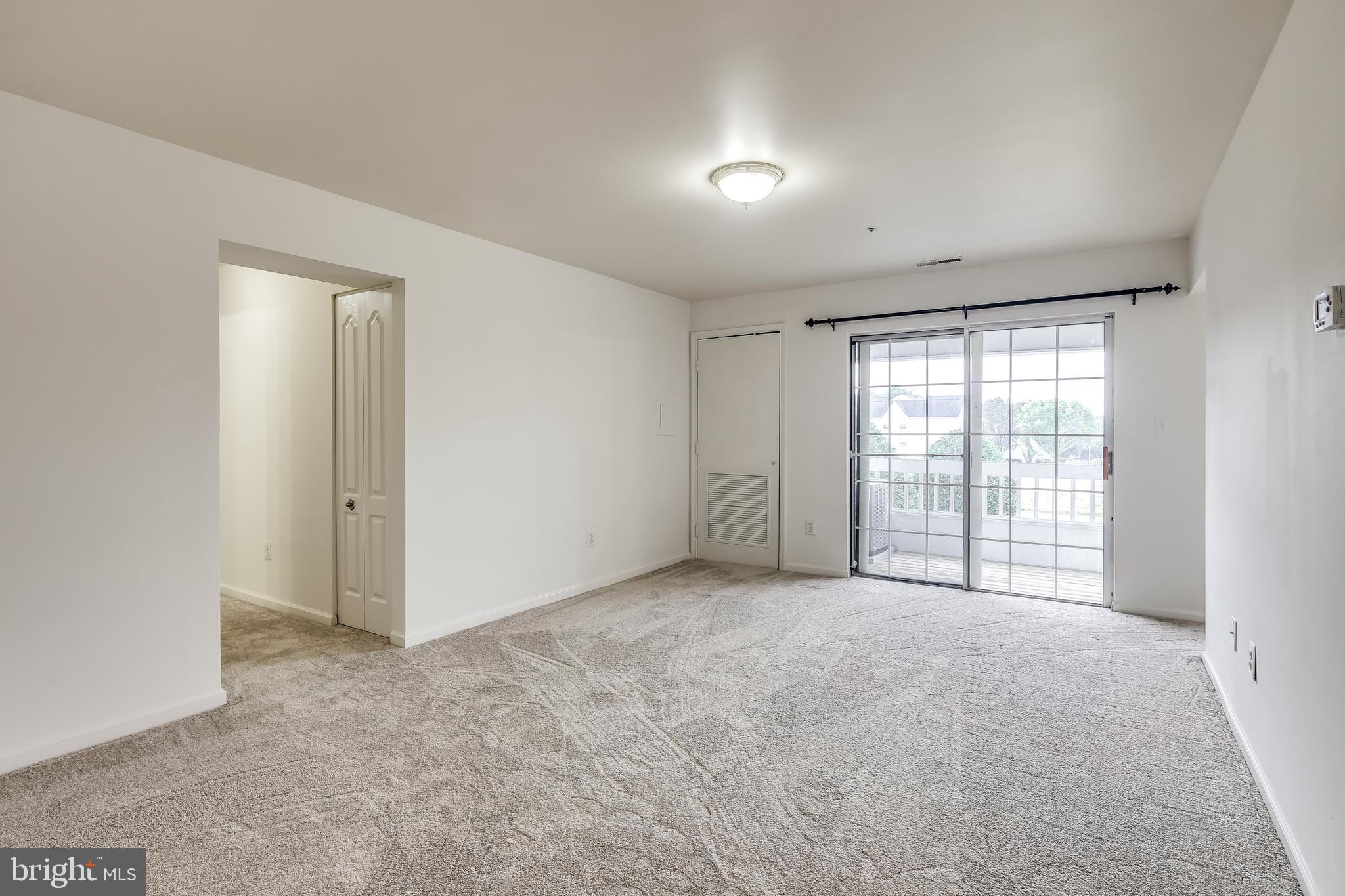 8341 Montgomery Run Road, Unit F Ellicott City, MD 21043 - Photo 5 of 29 Bright Living Room