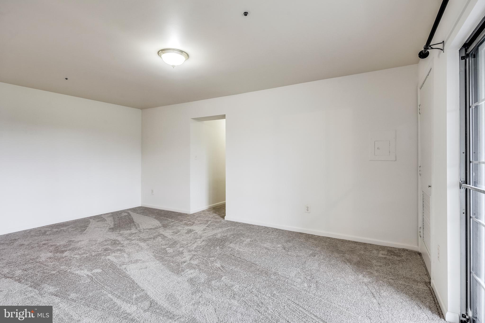 8341 Montgomery Run Road, Unit F Ellicott City, MD 21043 - Photo 7 of 29 Bright Living Room