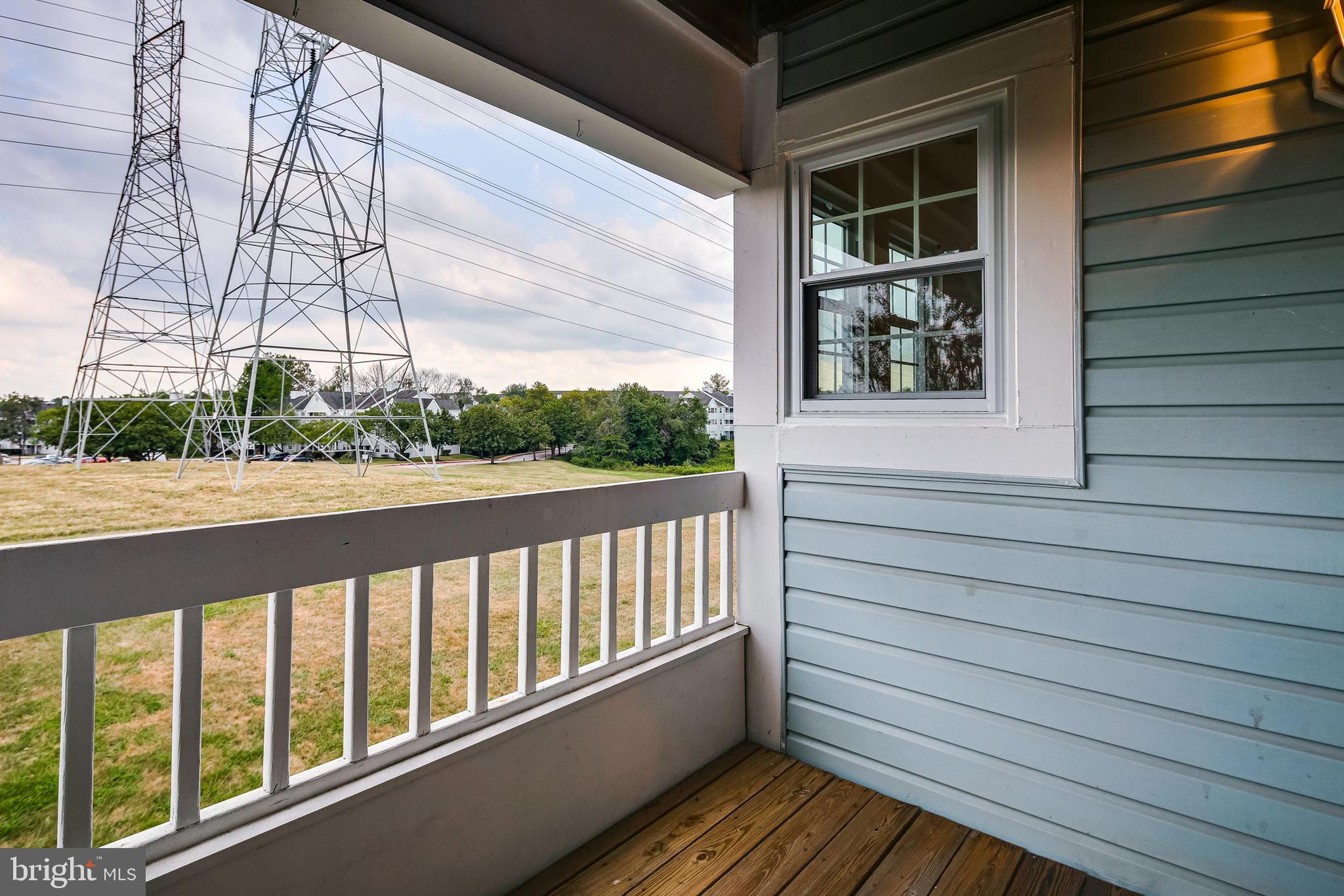 8341 Montgomery Run Road, Unit F Ellicott City, MD 21043 - Photo 8 of 29 Balcony Off Living Room