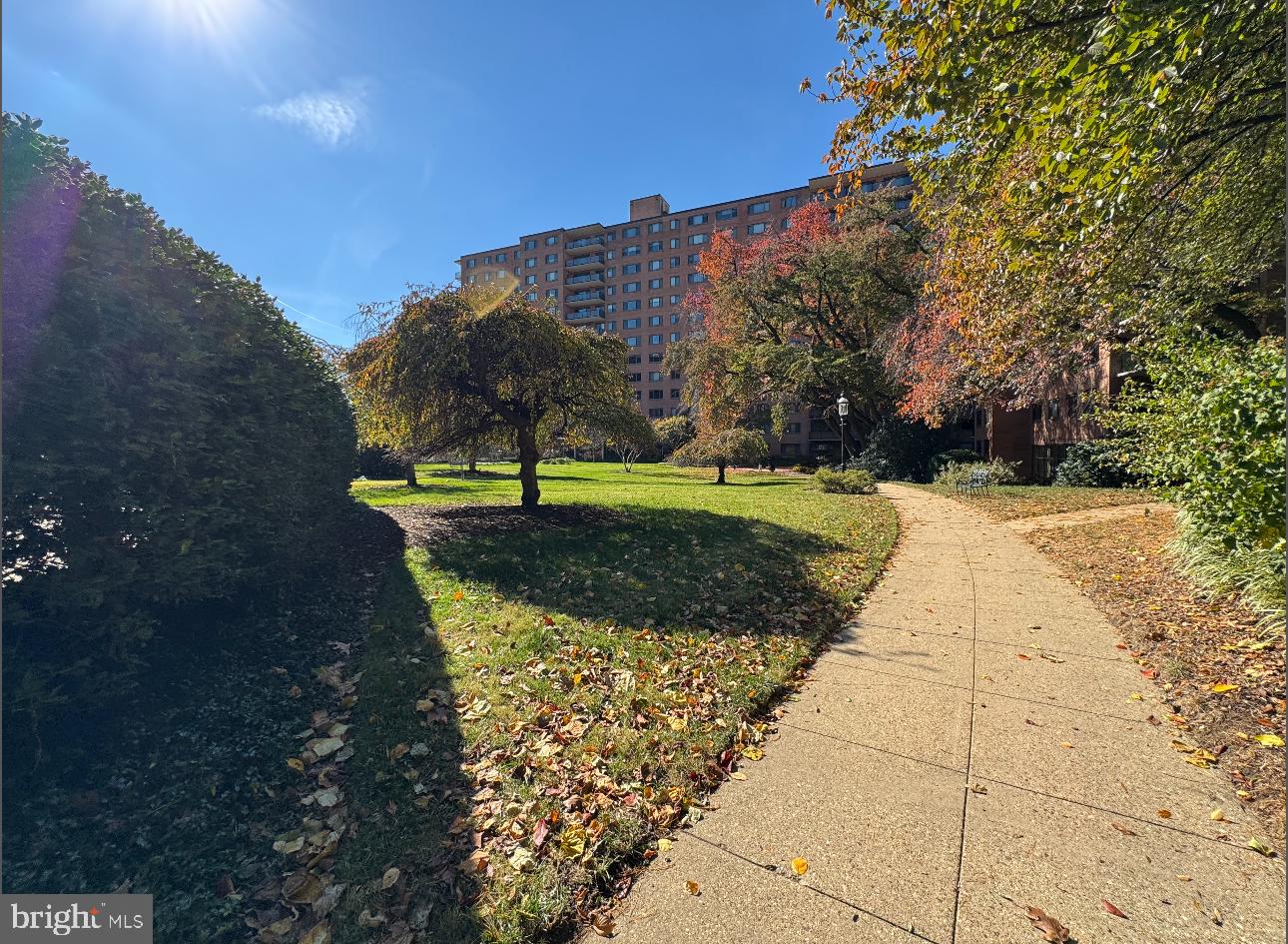 4201 Cathedral Avenue Northwest, Unit 1219E Washington, DC 20016 - Photo 19 of 20 a view of a pathway with a yard