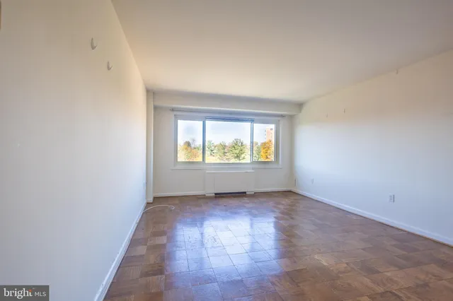 a kitchen with stainless steel appliances a sink stove and refrigerator