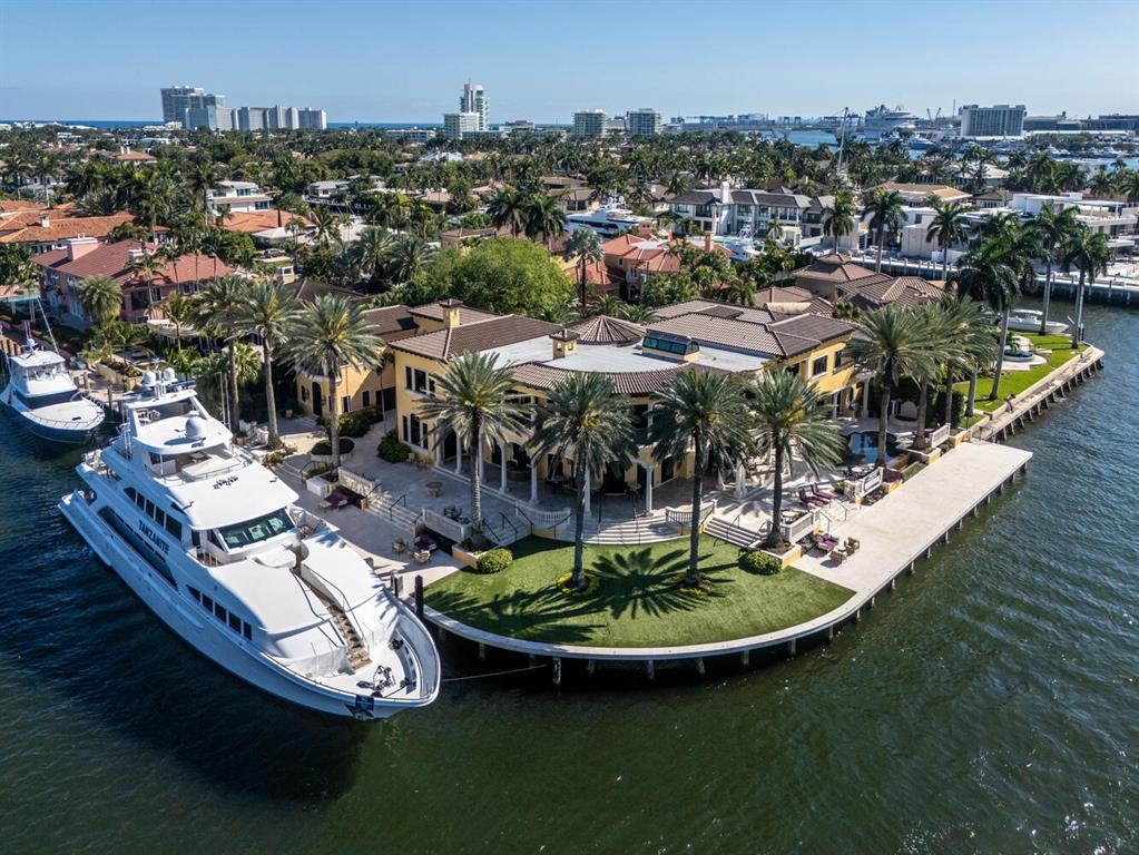 1 Isla Bahia Drive Fort Lauderdale, FL 33316 - Photo 18 of 100 a view of a lake with a house
