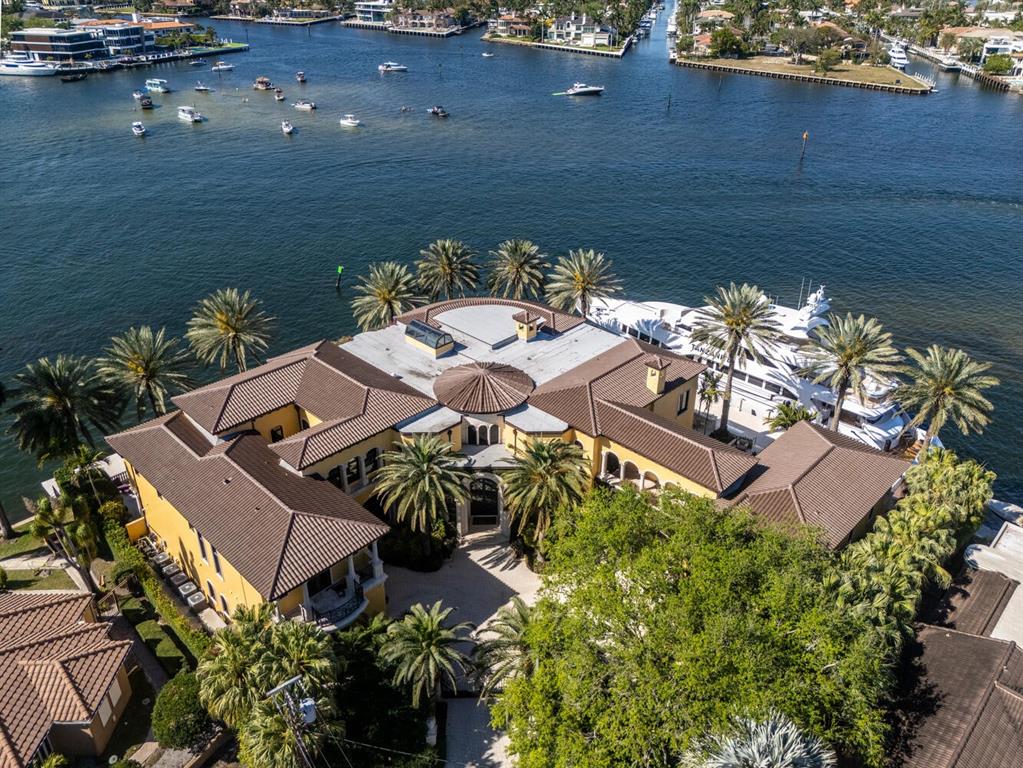 1 Isla Bahia Drive Fort Lauderdale, FL 33316 - Photo 22 of 100 an aerial view of a house with a lake view