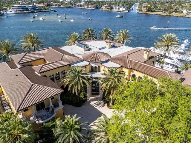 a bedroom with a bed and a mirror