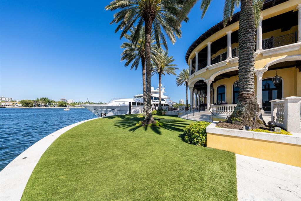 1 Isla Bahia Drive Fort Lauderdale, FL 33316 - Photo 27 of 100 a view of a house with pool and a yard