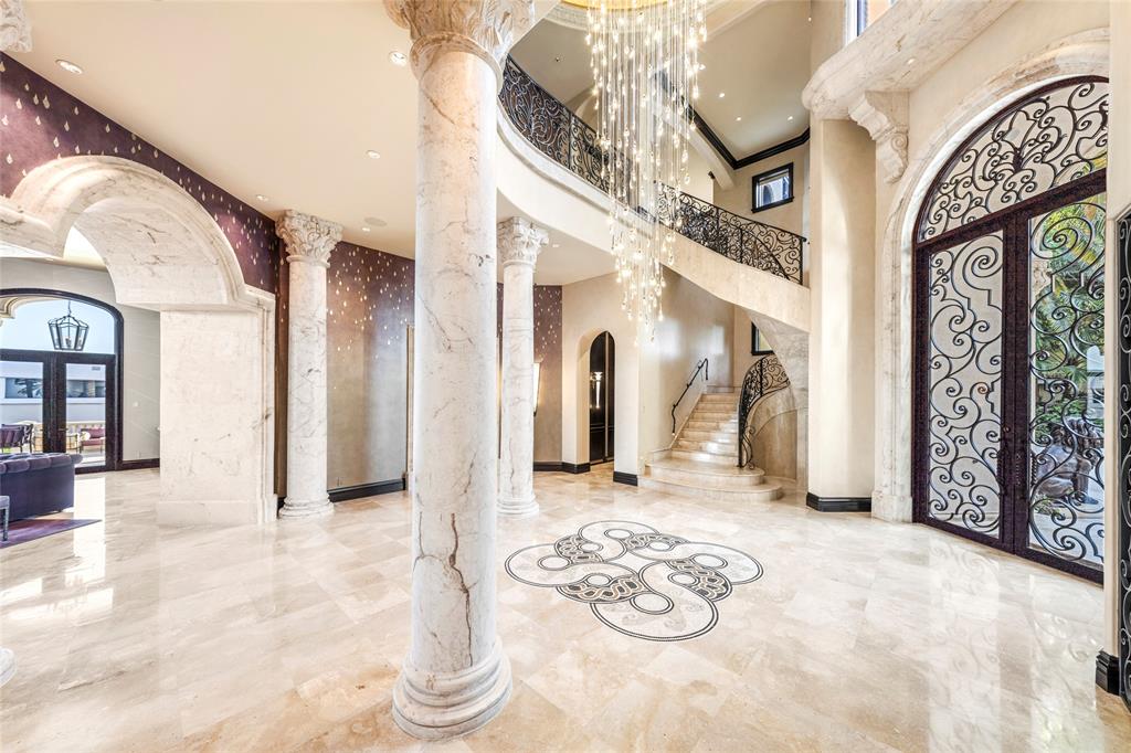 1 Isla Bahia Drive Fort Lauderdale, FL 33316 - Photo 52 of 100 a view of a hallway with furniture and chandelier