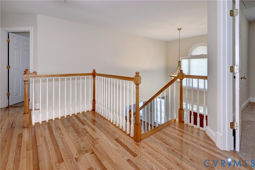 11385 Winding River Road Providence Forge, VA 23140 - Photo 25 of 43 a view of hallway with wooden floor
