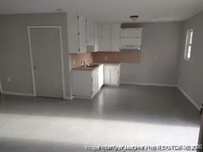 a view of cabinets and utility room