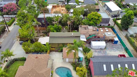 an aerial view of house with yard