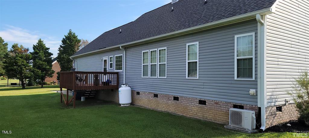 2891 Benson Hardee Road Benson, NC 27504 - Photo 14 of 51 Back View of Home with a nice deck off back of home.