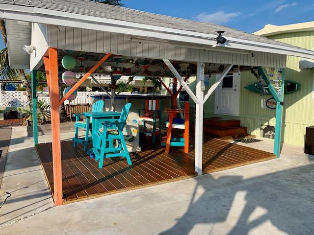 228 Upper Matecumbe Road Key Largo, FL 33037 - Photo 16 of 68 Back yard Chickee area angle 1