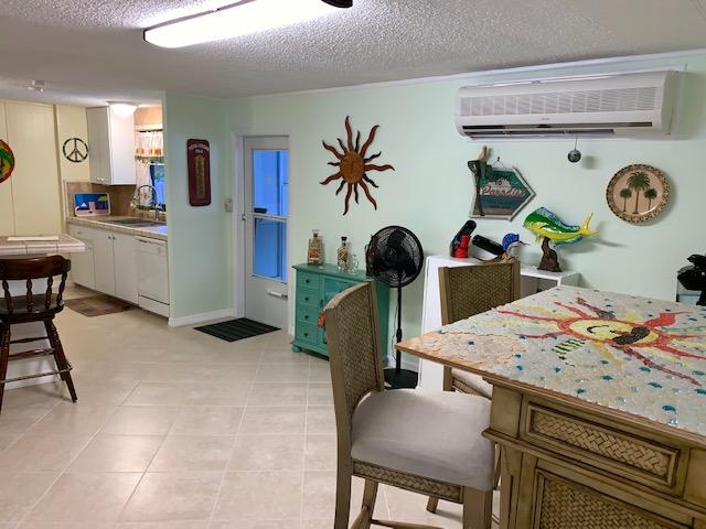228 Upper Matecumbe Road Key Largo, FL 33037 - Photo 33 of 68 Dining and kitchen area angle 1