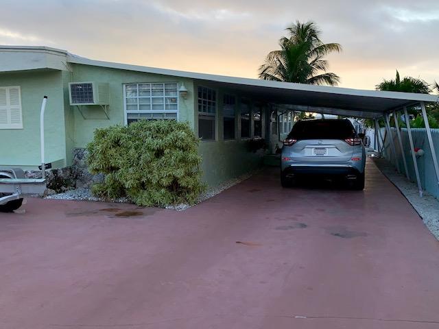 228 Upper Matecumbe Road Key Largo, FL 33037 - Photo 62 of 68 Carport and driveway
