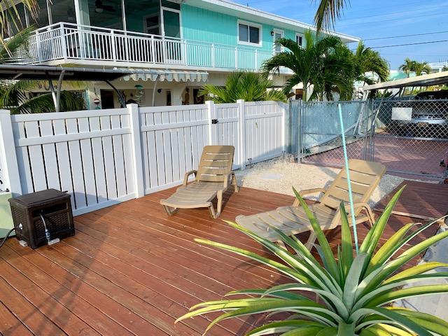 228 Upper Matecumbe Road Key Largo, FL 33037 - Photo 8 of 68 Sun Bathing area next to pool, dock and