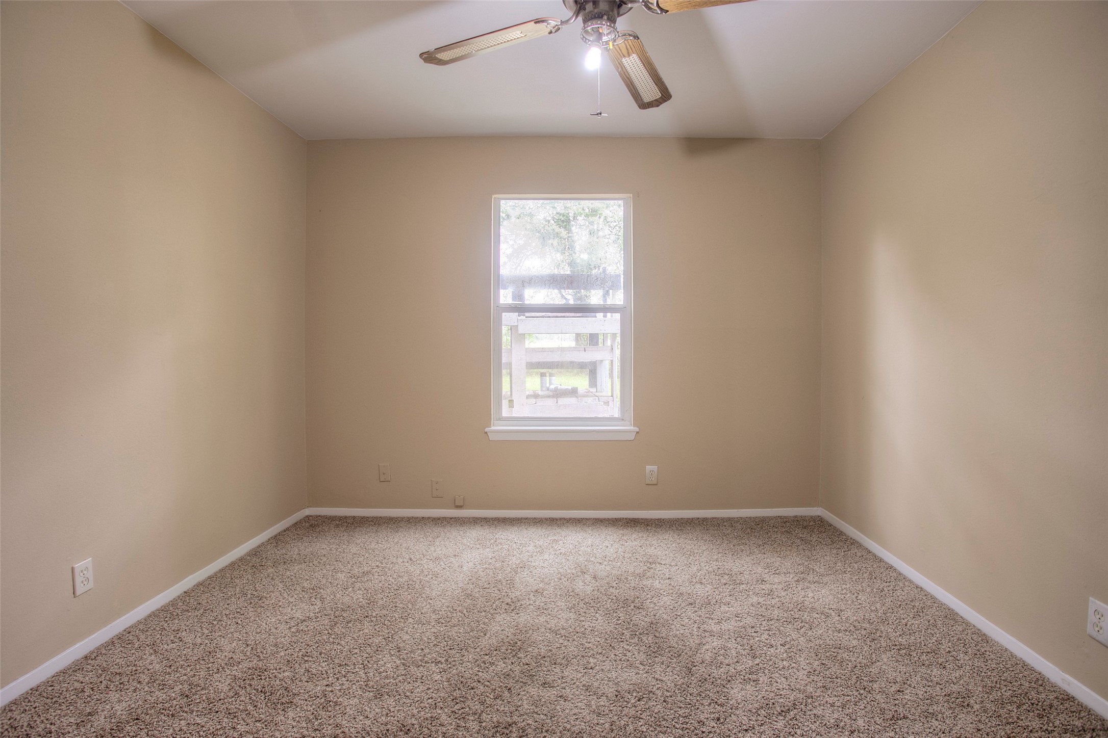81 Westlake Road Trinity, TX 75862 - Photo 18 of 23 an empty room with a window