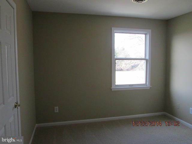 10638 Green Valley Road Union Bridge, MD 21791 - Photo 14 of 22 an empty room with a window