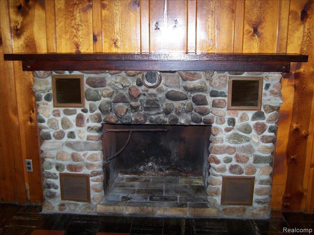 525 1st Street Rochester, MI 48307 - Photo 19 of 19 basement fireplace