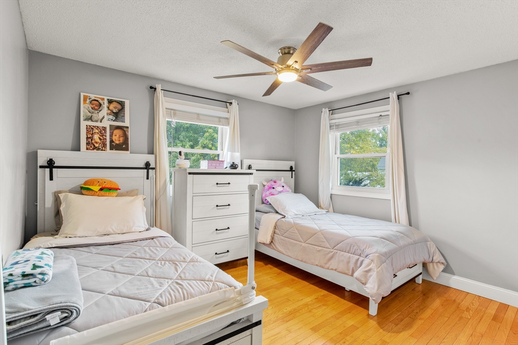 70 Underhill Street Nashua, NH 03060 - Photo 18 of 39 a bedroom with a bed and window