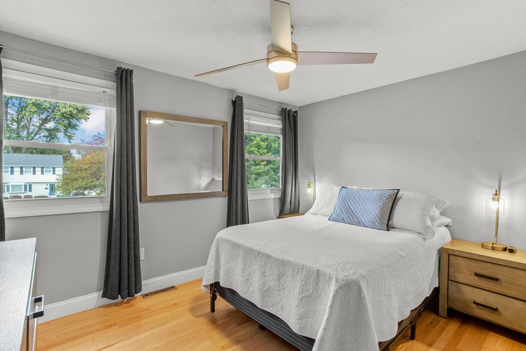 70 Underhill Street Nashua, NH 03060 - Photo 19 of 39 a bedroom with a bed and window
