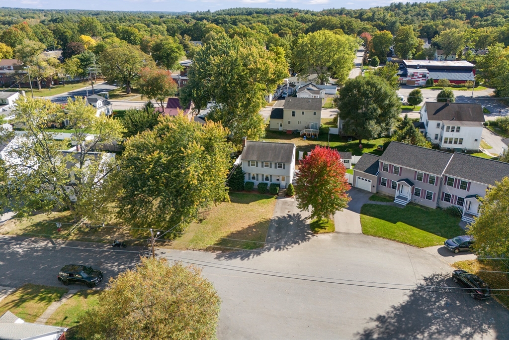 70 Underhill Street Nashua, NH 03060 - Photo 2 of 39 an aerial view of a house with a yard basket ball court and outdoor seating