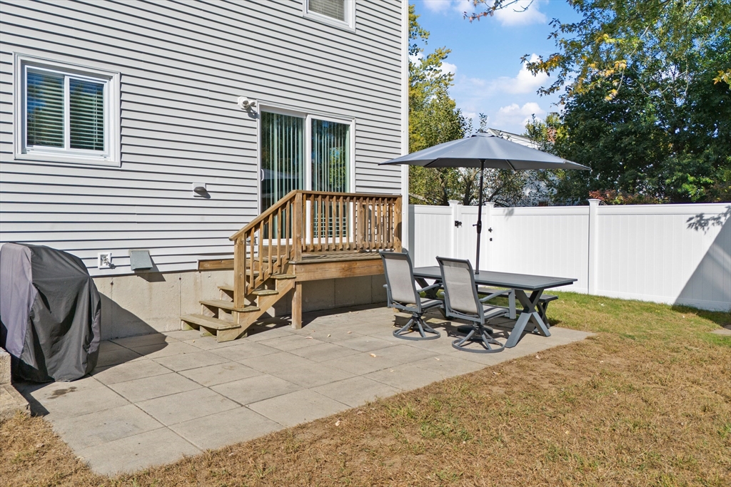 70 Underhill Street Nashua, NH 03060 - Photo 34 of 39 a view of house with outdoor seating area