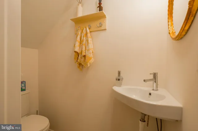 a bathroom with a sink and mirror