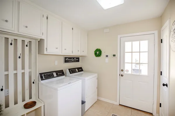 a view of a house with swimming pool