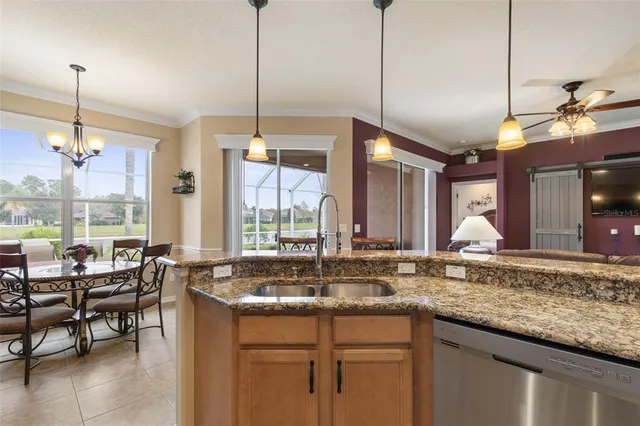 a bedroom with a bed dresser and a window