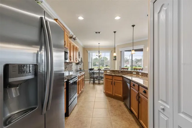 a bathroom with a shower and a glass door