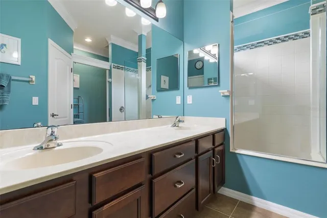 an aerial view of a houses with a lake view