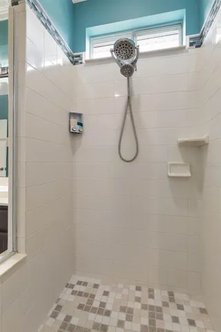 an aerial view of residential building and lake